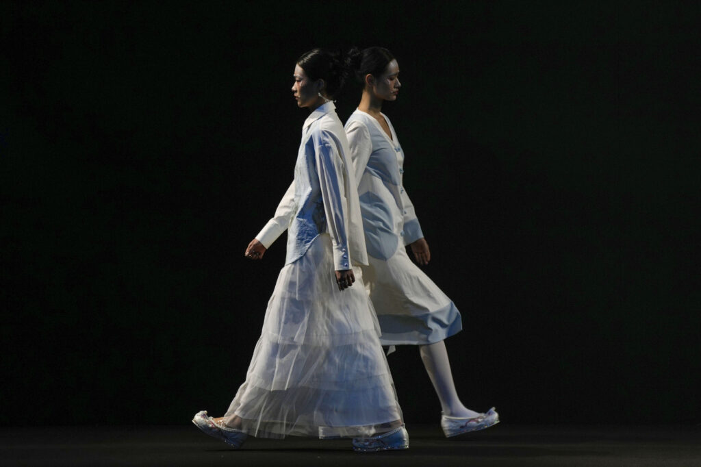 BEIJING — A stroke of Puritanic coverup: Models wear creations from Hanxi Zhang during the China Fashion Week in Beijing, Wednesday, March 27, 2024.Photo: Tatan Syuflana/AP
