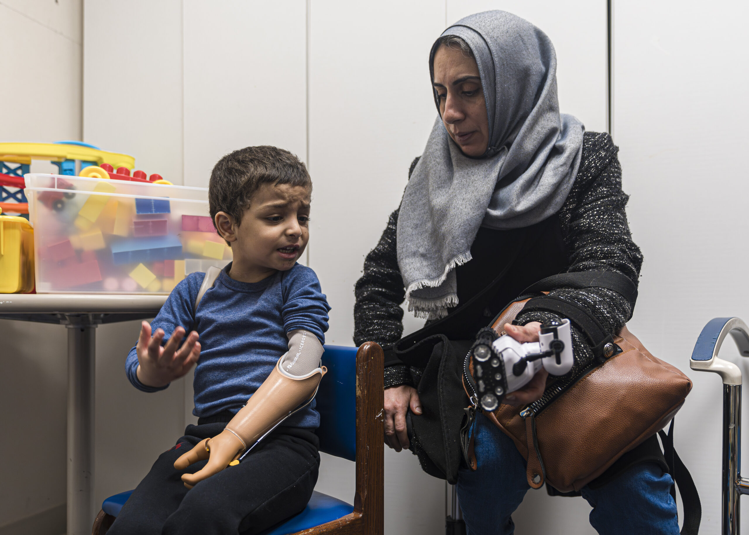 PHILADELPHIA — More stories like this will continue to emerge about Palestine as the war over Gaza continues: Four-year-old Omar Abu Kuwaik expresses frustration at using his new prosthetic arm with his aunt, Maha Abu Kuwaik, during an occupational therapy session at Shriners Children's Hospital on Wednesday, Feb. 28, 2024, in Philadelphia. Through the efforts of family and strangers, Omar was brought out of Gaza and to the United States, where he received treatment, including a prosthetic arm. He spent his days in a house run by a medical charity in New York City, accompanied by his aunt.Photo: Peter K. Afriyie/AP