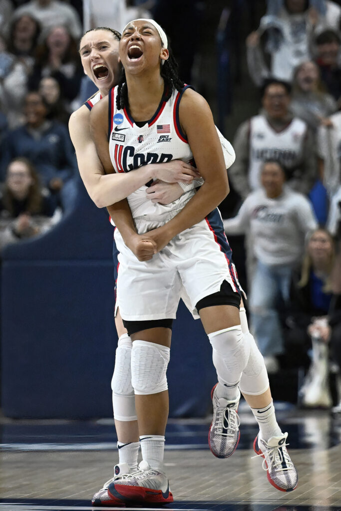 CONNECTICUT — Good feelings run high in March Madness, women’s division: UConn guard Paige Bueckers, left, celebrates with teammate KK Arnold in the second half of a second-round college basketball game in the NCAA Tournament against Syracuse, Monday, March 25, 2024, in Storrs, CT.Photo: Jessica Hill/AP