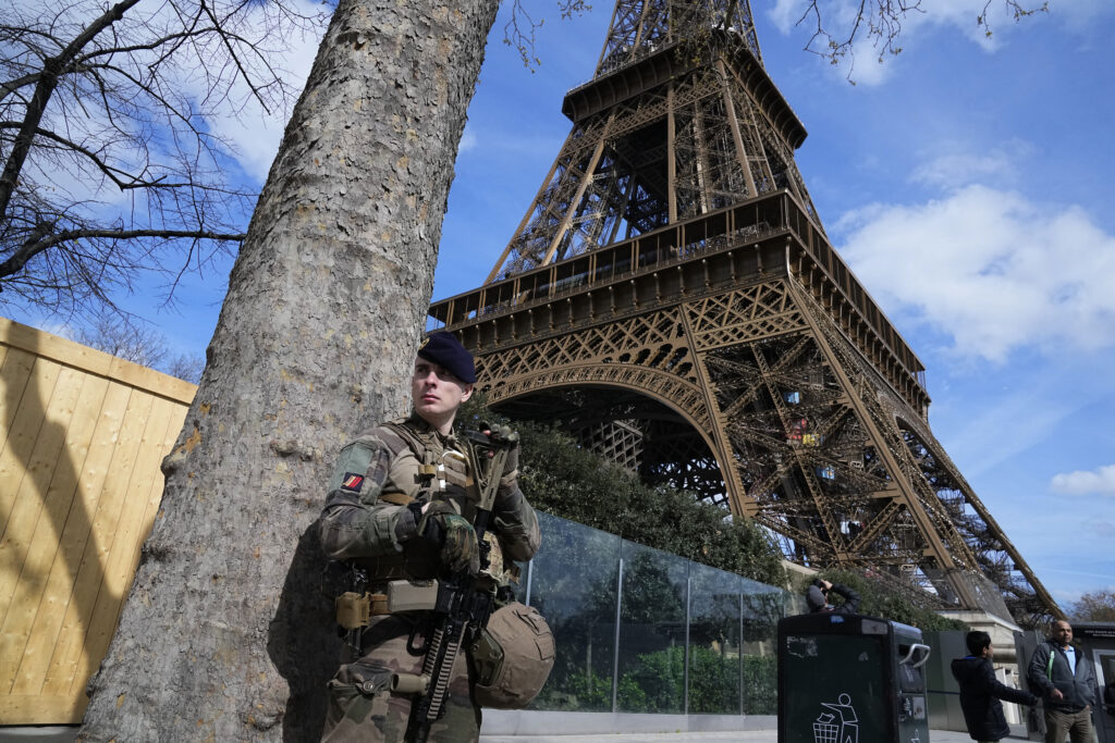 PARIS — Bombing in Moscow concert hall creates global alert: A soldier patrols at the Eiffel Tower, Monday, March 25, 2024, in Paris. France's government increased its security alert posture to the highest level on Sunday, March 24, 2024, after the deadly attack at a Russian concert hall and the Islamic State's claim of responsibility.Photo: Michel Euler/AP