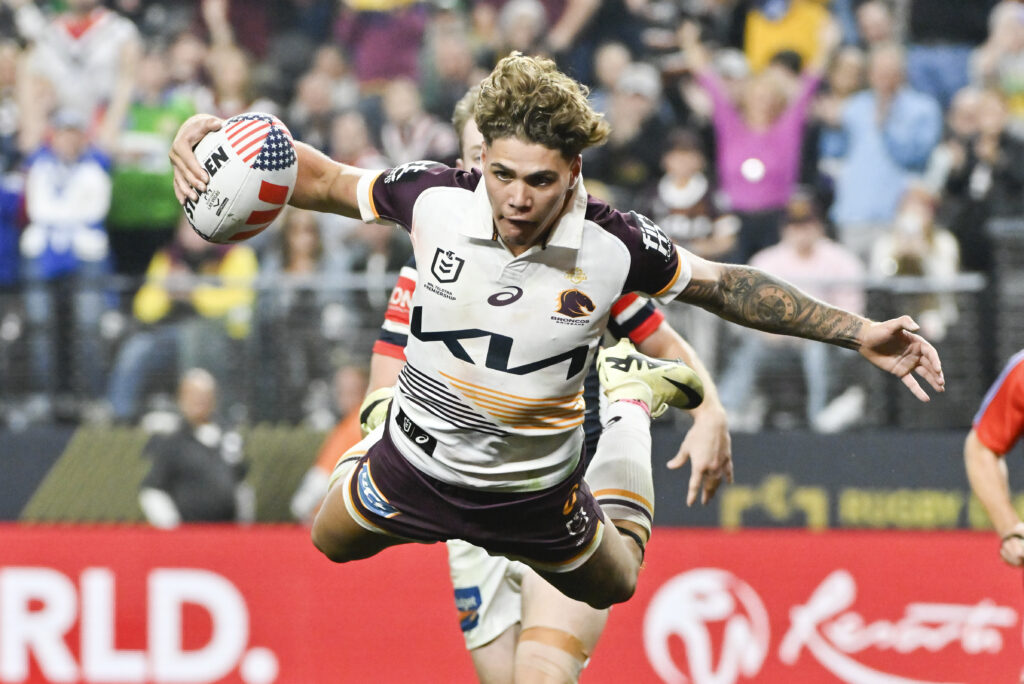LAS VEGAS — He swoops, he scores: Broncos Reece Walsh is airborne as he scores a try during the NRL match between the Sydney Roosters and the Brisbane Broncos at Allegiant Stadium in Las Vegas, Saturday, March 2, 2024.Photo: David Becker/AP