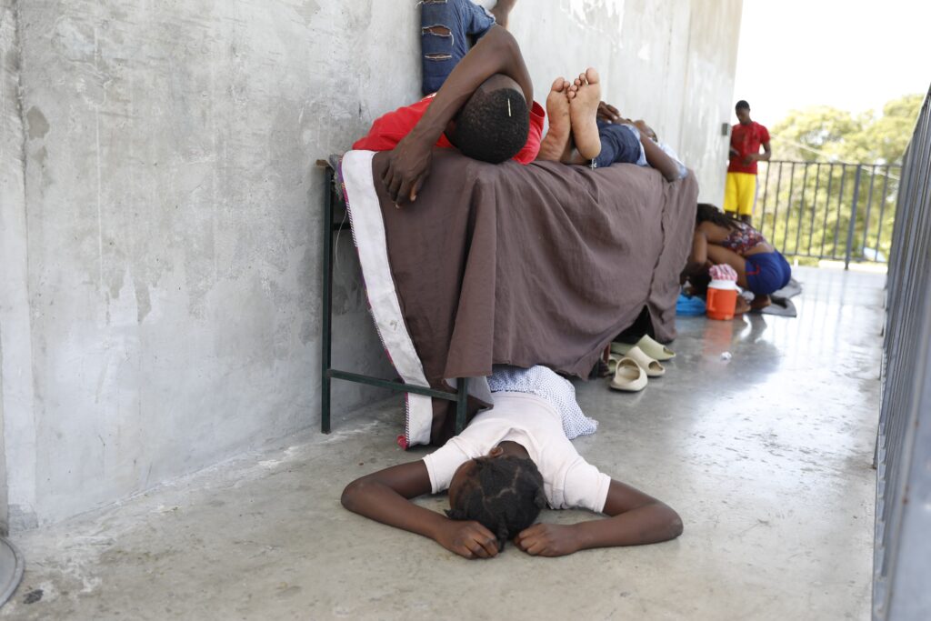 PORT-AU-PRINCE — Crisis in Haiti continues: Residents who were displaced from their homes due to clashes between police and gang members rest at a public school serving as a shelter in Port-au-Prince, Haiti, Friday, March 8, 2024.Photo: Odelyn Joseph/AP