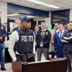 This photo provided by the Office of New York City Police Department Assistant Commissioner Kaz Daughtry, Monday, Feb. 5, 2024, shows New York Mayor Eric Adams, left center, who joined investigators and specialized teams as they carried out a search warrant.