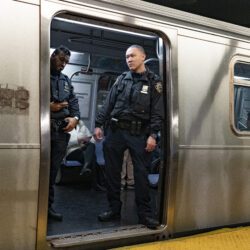 NYPD officers stand aboard a train at the West Fourth Street subway station, Saturday, Jan. 13, 2024. Photo: Peter K. Afriyie/AP