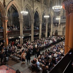 The stately landmarked interior of St. Ann & Holy Trinity Church, lined by famous William Bolton stained glass windows, was packed for impactful storytelling, hosted by The Moth.Photo: Brooklyn Eagle Staff