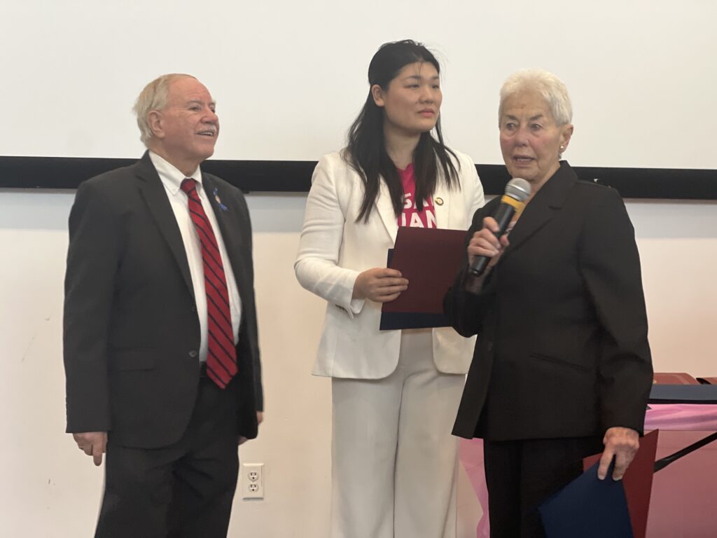 Honoree Eileen LaRuffa (right) accepting her award from Assemblyman William Colton and Councilmember Susan Zhuang. Brooklyn Eagle Photos by Wayne Daren Schneiderman
