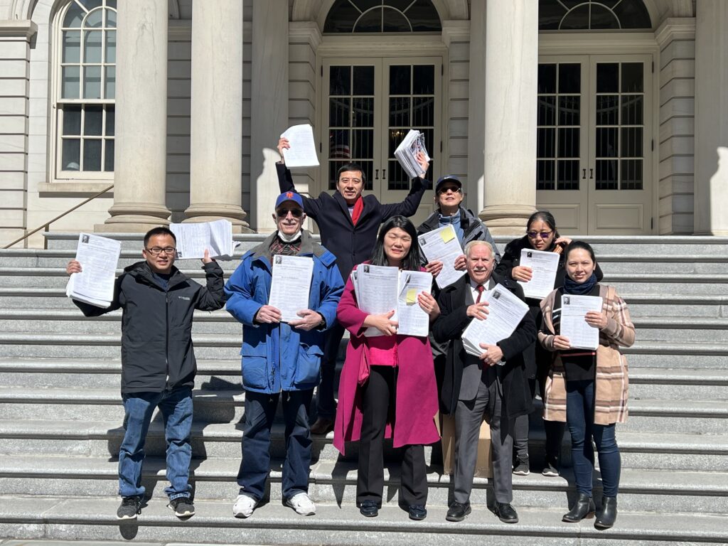 Councilmember Susan Zhuang, Assemblyman William Colton and a group of neighborhood advocates displayed the petitions on the steps of City Hall before bringing them inside to deliver them to the mayor’s office.<br>Photo courtesy of Assemblymember Colton’s office