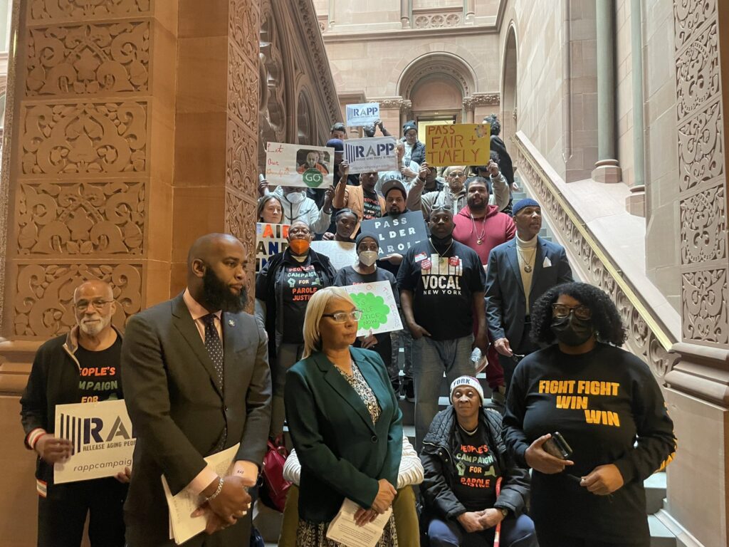Assembly Member Maritza Davila and Assembly Member Brian Cunningham stand united in front of a determined crowd of advocates and protesters, rallying for the passage of the Elder Parole and Fair & Timely Parole bills, in Albany.Photo courtesy of Release Aging People in Prison Campaign