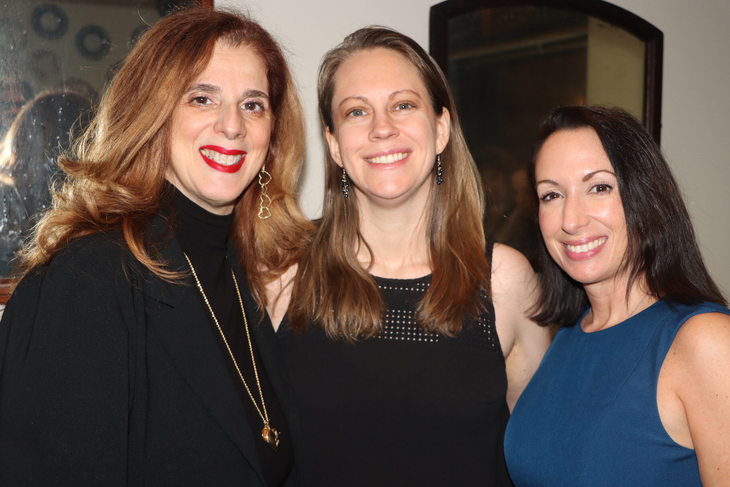 From left: Yolanda Guadagnoli, president of the Columbian Lawyers Association of Kings County, Shannon Calabrese and Marisa Arrabito at Kurtz’s retirement party.