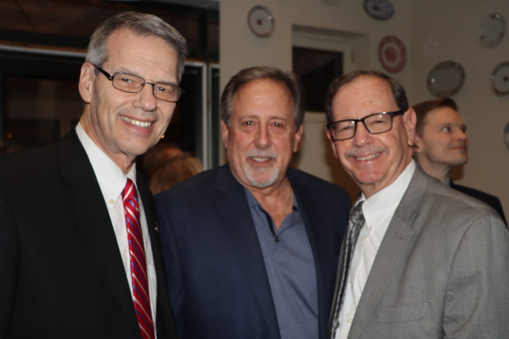 Justice Donald Kurtz (center) with friends and colleagues, Hon. Lawrence Knipel (left) and Hon. Mark Partnow, at the retirement party for Justice Kurtz in Downtown Brooklyn last month.Brooklyn Eagle photos by Mario Belluomo