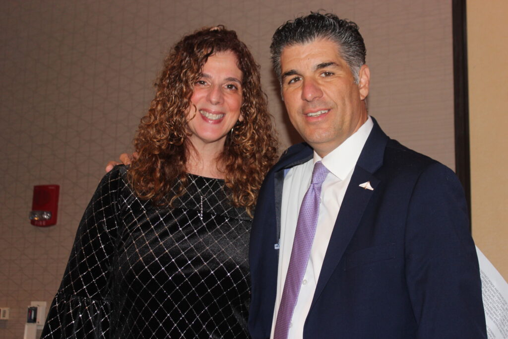 Dominic Famulari was introduced by Yolanda Guadagnoli, the president of the Columbian Lawyers Association of Brooklyn, during the Winter Seminar.