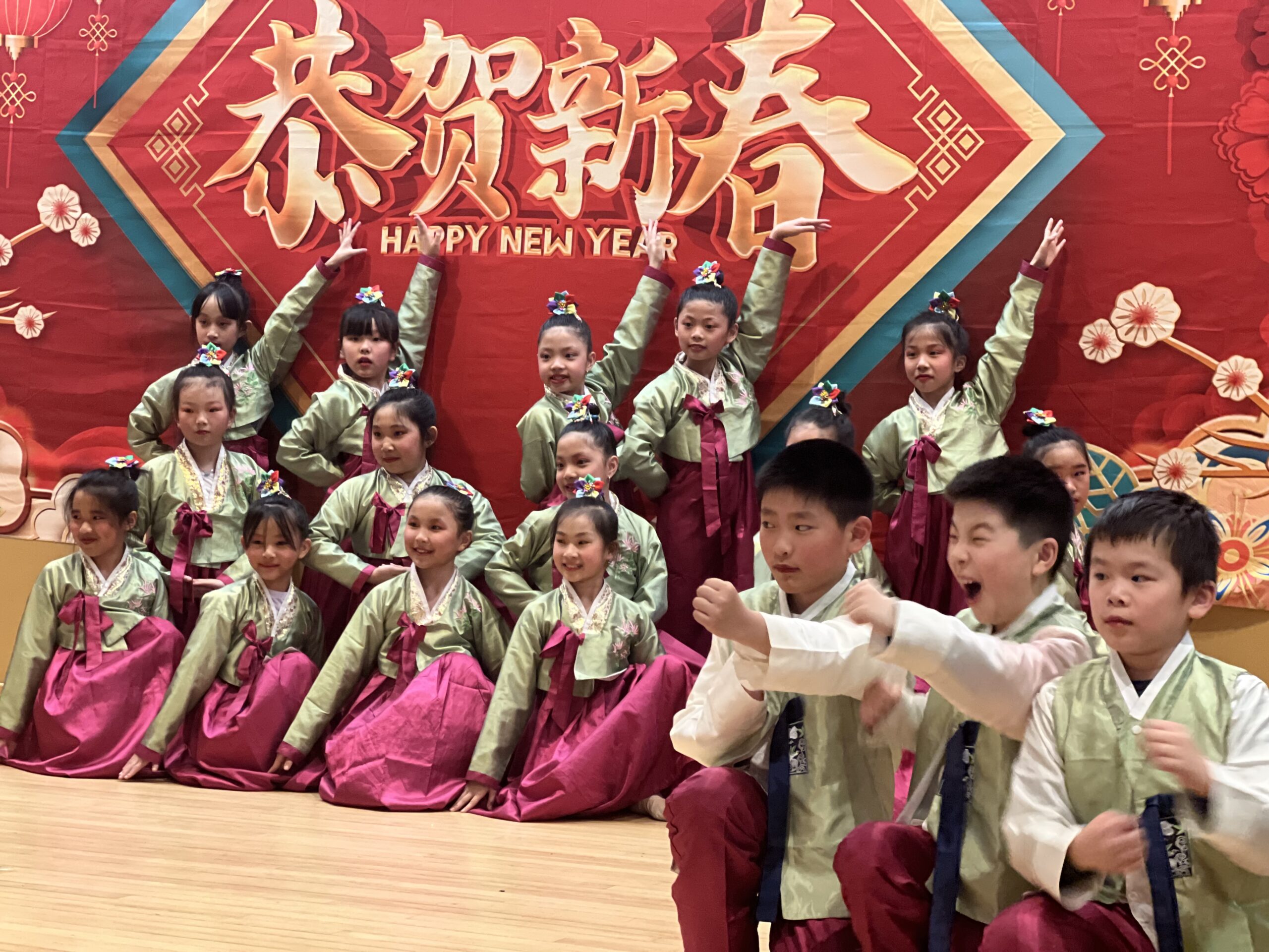 Striking a pose. Asian schoolchildren from Brooklyn proudly keep their culture alive in Lunar New Year festivals at Maimonides Lunar New Year.Photos by Wayne Daren Schneiderman