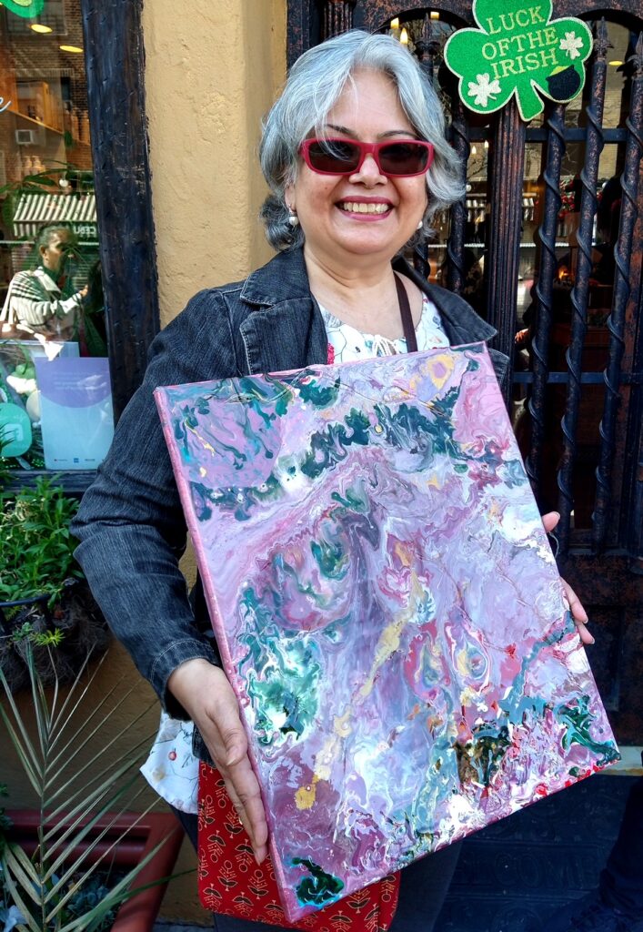 Aeilushi Mistry and one of her creations at Bay Ridge Art Walk.