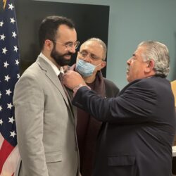 New member Randy Haddad being pinned by fellow member Ralph Succar at Salaam Club second meeting.