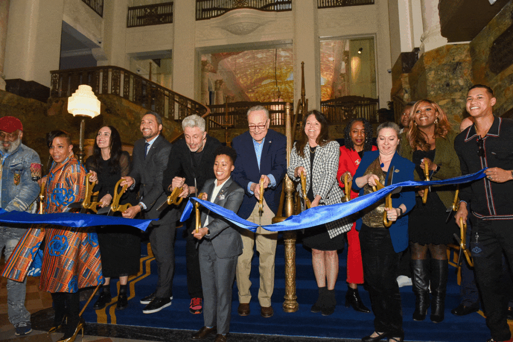From Left to Right: Founder Def Poetry, Danny Simmons Jr.; NYC Commissioner of Cultural Affairs, Laurie Cumbo; Sr. VP of Booking at Live Nation, Stacie George; NYS Secretary of State, Robert Rodriguez; President of Live Nation Venues, Tom See; Councilmember Crystal Hudson; Sen. Chuck Schumer; President of Long Island University, Kimberly Cline; Congressmember Yvette Clark; Brooklyn Paramount General Manager, Margaret Holmes; Deputy Borough President, Kim Council; and Councilmember Farah Louis cut the ribbon at the Brooklyn Paramount opening night on March 27, 2024.Brooklyn Eagle photos by Beth Eisgrau-Heller