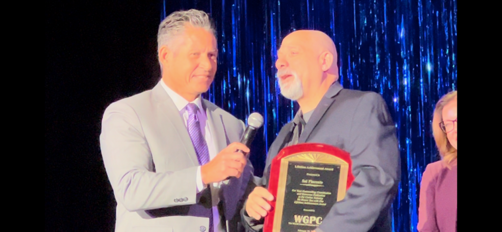 Sal Piacente receives his award.