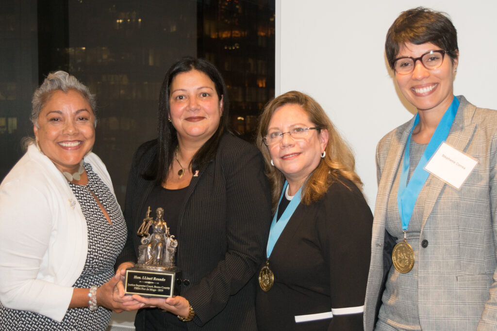 Hon. Llinét Rosado has been appointed as co-chair of the New York State Judicial Committee on Women in the Courts, having served as an Associate Justice of the Appellate Division, First Department, since July 2023. Pictured is Justice Rosato (second from left) receiving the Flor De Maga Award from the Puerto Rican Bar Association. She is seen here with Hon. Sallie Manzanet-Daniels (left), Hon. Carmen Pacheco and Stephanie Correa.Brooklyn Eagle Photo by Robert Abruzzese