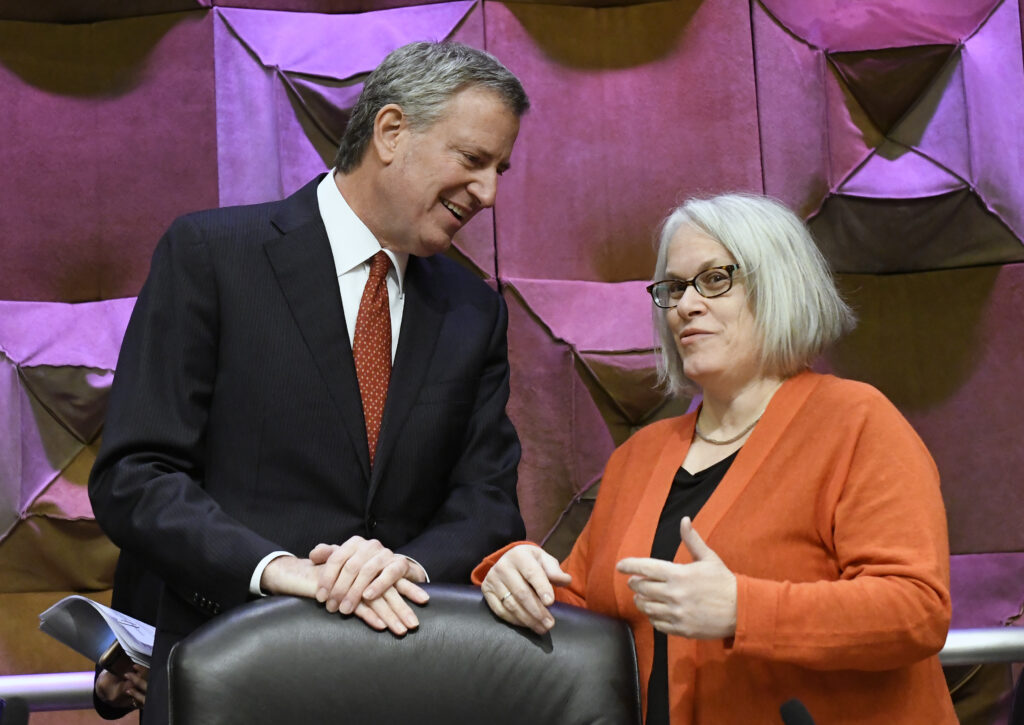 New York City Mayor Bill de Blasio speaks with Assemblywoman Helene Weinstein.
