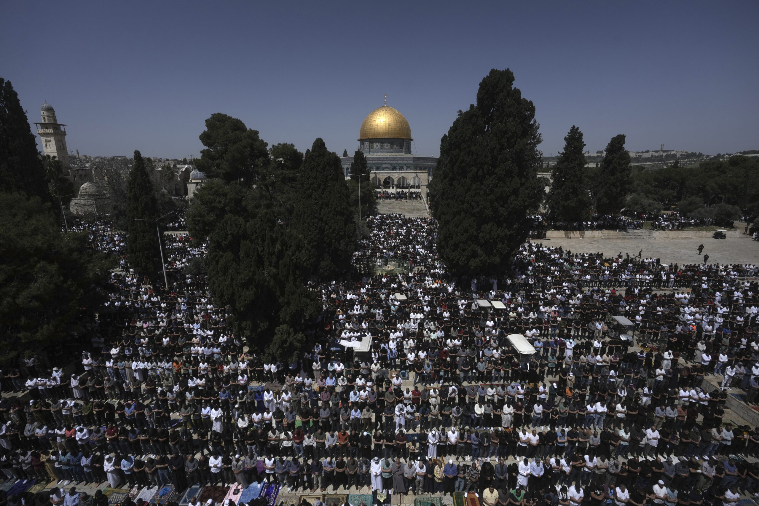Muslim worshippers at the Al-Aqsa Mosque compound take part in the last Friday prayers of the holy month of Ramadan, in the Old City of Jerusalem, Friday, April 5, 2024. (AP Photo/Mahmoud Illean)