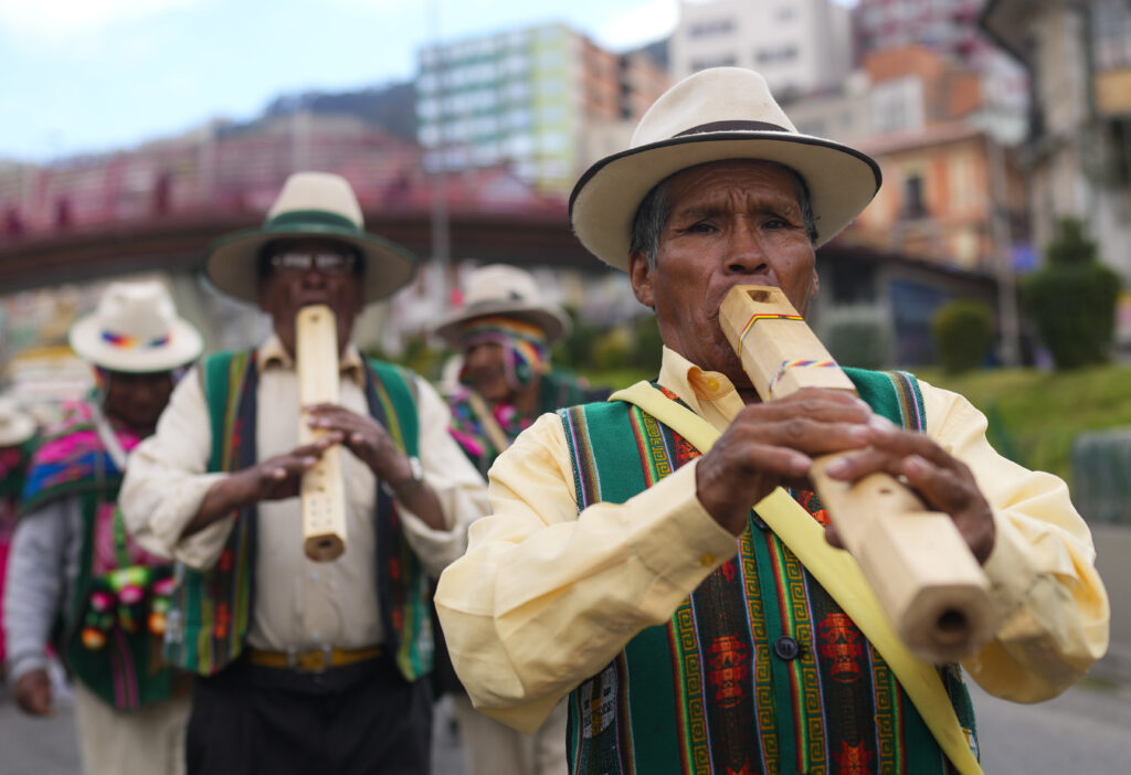 Aymara Indigenous musicians play during a ceremony in honor of the "Pachamama," or Mother Earth, on Earth Day in La Paz, Bolivia, Monday, April 22, 2024. (AP Photo/Juan Karita)
