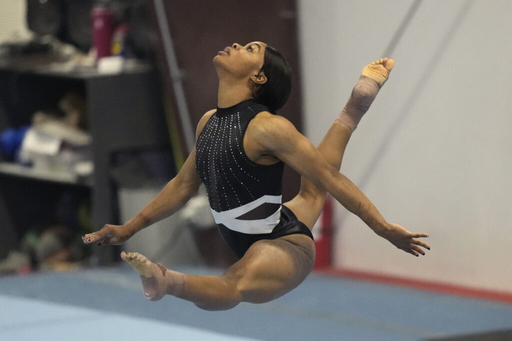 Gabby Douglas performs her floor routine while competing at the American Classic gymnastics meet, Saturday, April 27, 2024, in Katy, Texas. (AP Photo/David J. Phillip)