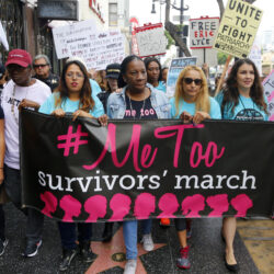 In this Nov. 1, 2017, file photo, Tarana Burke, founder and leader of the #MeToo movement, marches with others at the #MeToo March in the Hollywood section of Los Angeles.