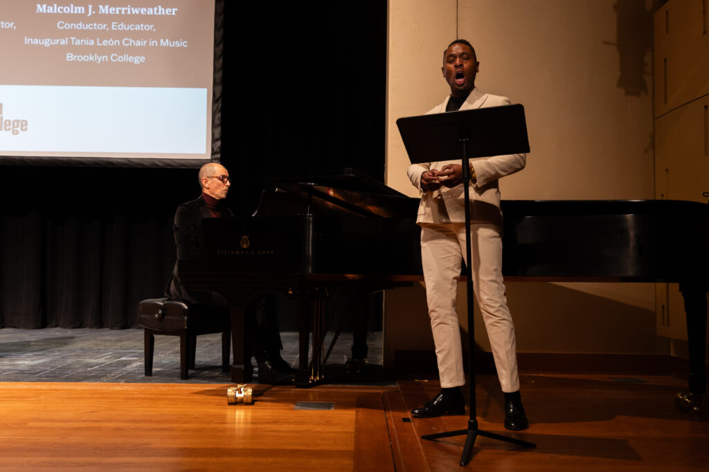 (From left) Associate Professor Malcolm J. Merriweather performs at the Presidential Lecture Series event.