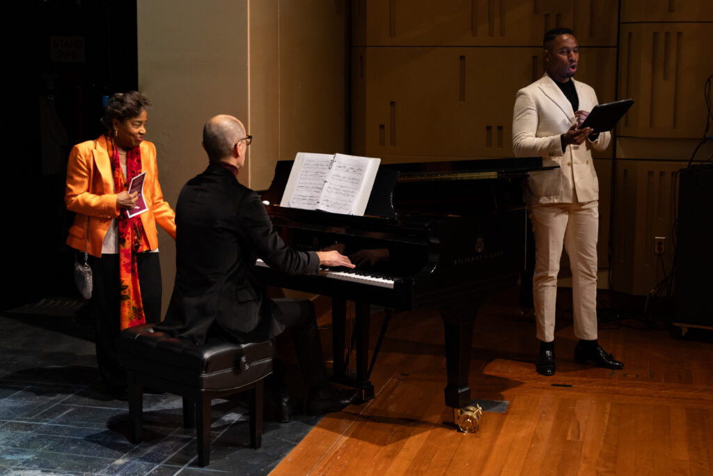 Tania León observes Associate Professor Malcolm J. Merriweather’s performance at the Presidential Lecture Series event.