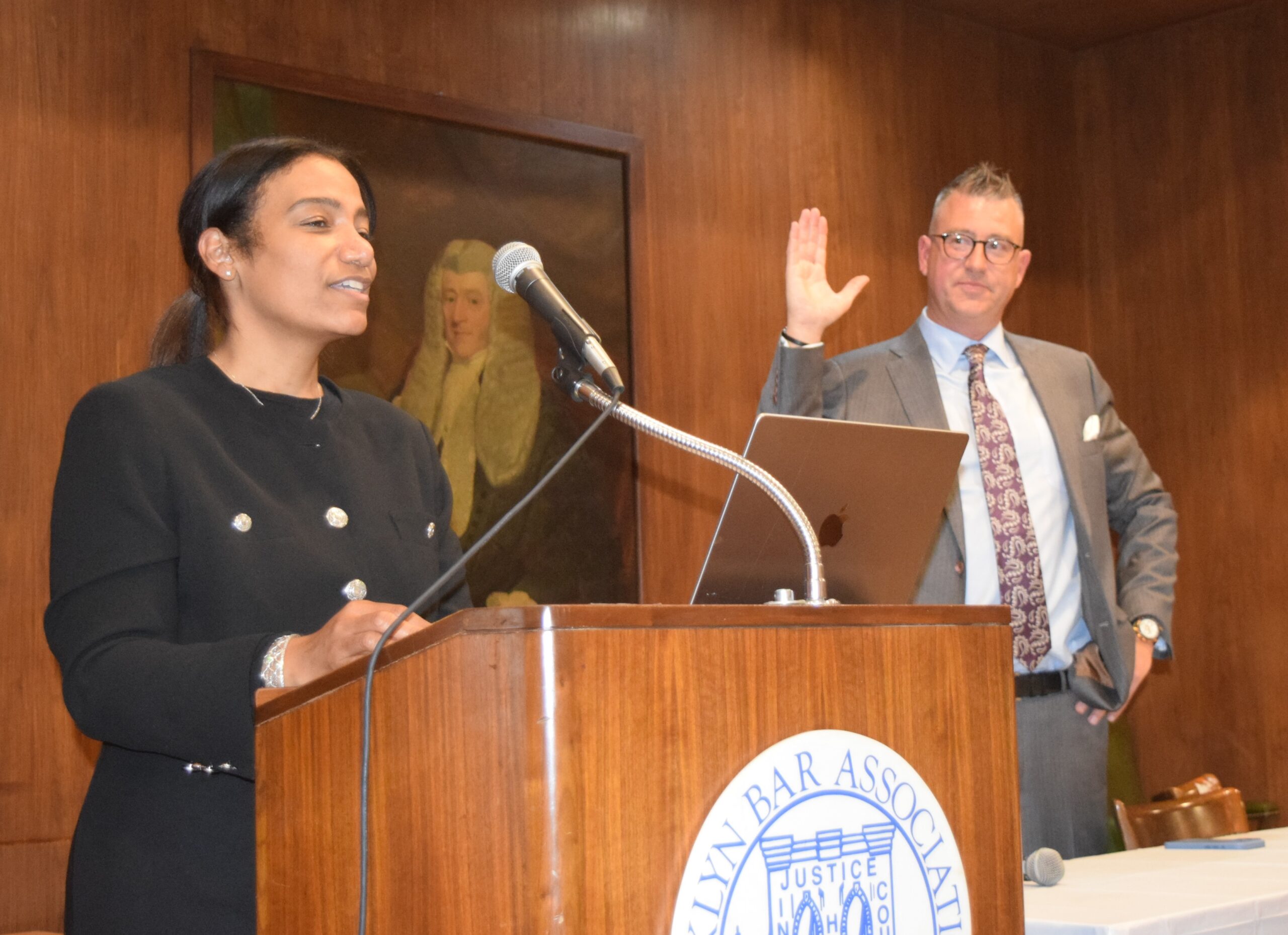 Judge Keshia Espinal administers the oath of office to Darran Winslow, marking his continuation as President of the Kings County Criminal Bar Association (KCCBA) for another year at KCCBA CLA on Federal Crimes. Brooklyn Eagle photos by Robert Abruzzese