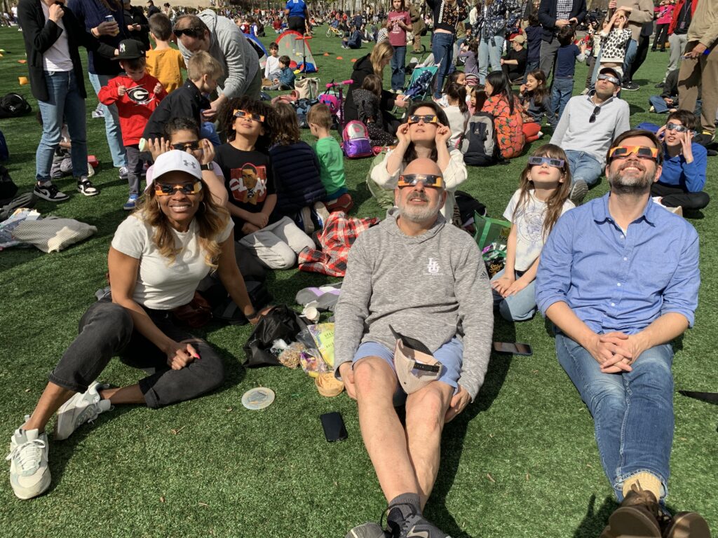 Friends enjoyed the great weather and the party atmosphere in Brooklyn during Monday’s eclipse.