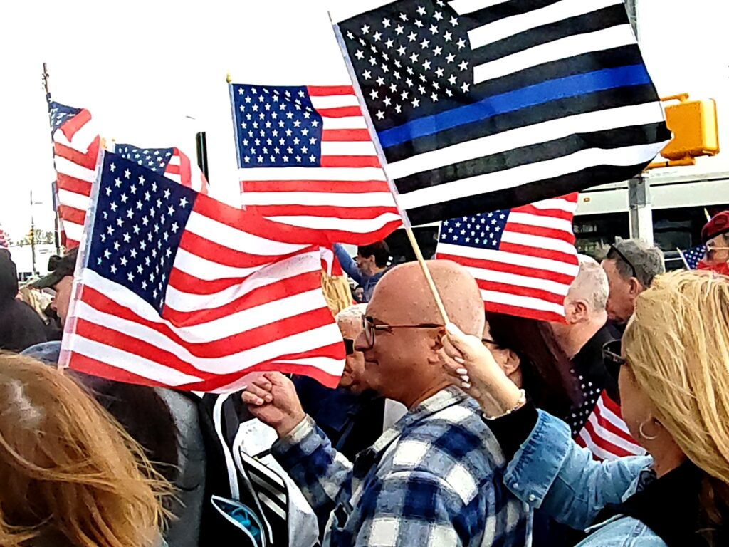 There was no shortage of American flags at the community rally Sunday.