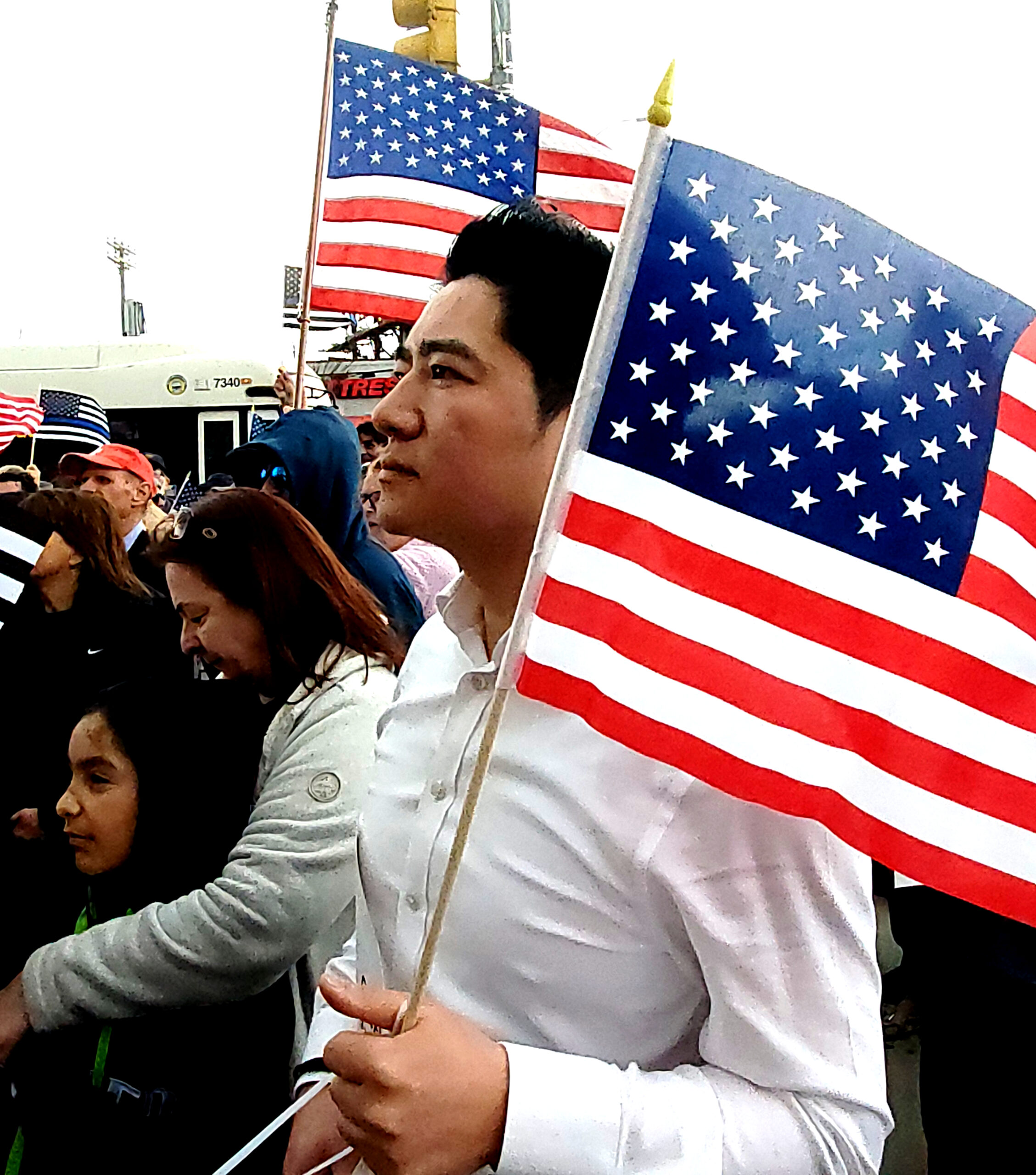 Man with flag at immigration protest
