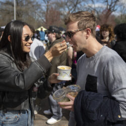 Lianne Yaacoby feeds Alec Schonfeld at Prospect Park Smorgasburg.
