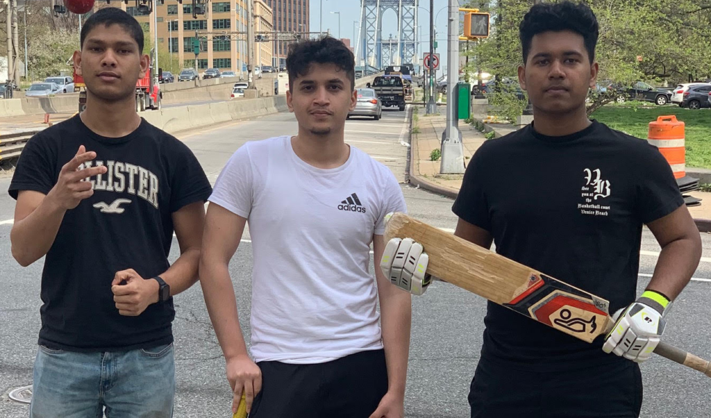In front of the Brooklyn approach to the Manhattan Bridge (left to right): M.D. “Mahi” Hussan (vice captain), Zohaib Hassan (captain) and M.D. Khalid.