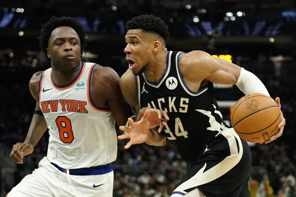 Milwaukee Bucks' Giannis Antetokounmpo (34) drives to the basket against New York Knicks' OG Anunoby (8) during the second half of an NBA basketball game Sunday, April 7, 2024, in Milwaukee. (AP Photo/Aaron Gash)