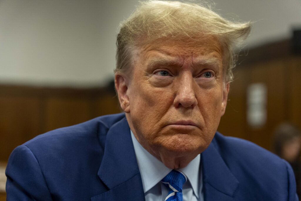 Former President Donald Trump awaits the start of proceedings on the second day of jury selection at Manhattan criminal court, Tuesday, April 16, 2024, in New York. Donald Trump returned to the courtroom Tuesday as a judge works to find a panel of jurors who will decide whether the former president is guilty of criminal charges alleging he falsified business records to cover up a sex scandal during the 2016 campaign. (Mark Peterson/Pool Photo via AP)