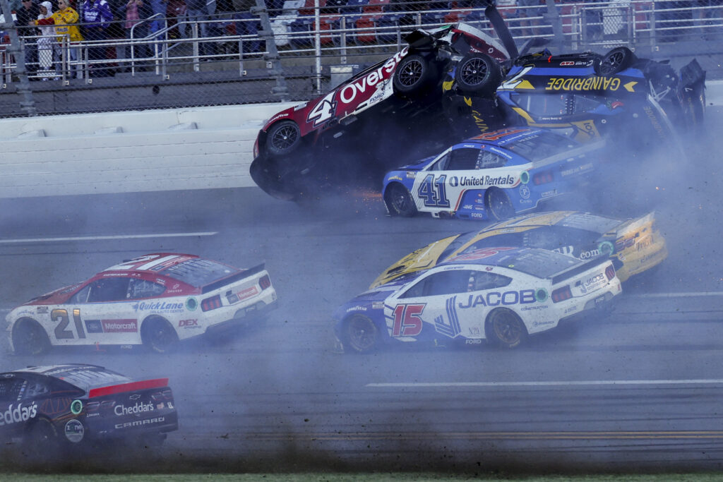 NASCAR Cup Series driver's Ryan Preece (41) Josh Berry (4) and Corey LaJoie (7), upside down, crash on the final lap during a NASCAR Cup Series auto race at Talladega Superspeedway, Sunday, April 21, 2024, in Talladega. Ala. (AP Photo/Butch Dill)