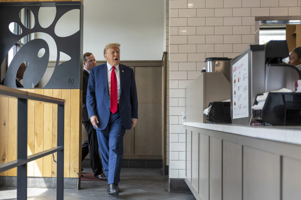 Republican presidential candidate former President Donald Trump visits a Chick-fil-A eatery, Wednesday, April 10, 2024, in Atlanta. (AP Photo/Jason Allen)
