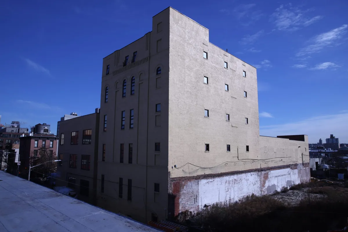 The city has began to house migrant men in a former factory building along the Gowanus Canal, Dec. 22, 2023.