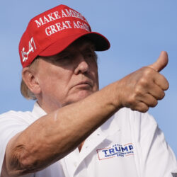 Republican presidential candidate former President Donald Trump gives a thumbs up as he watches play on the 18th hole green during the final round of LIV Golf Miami. Photo: Rebecca Blackwell/AP