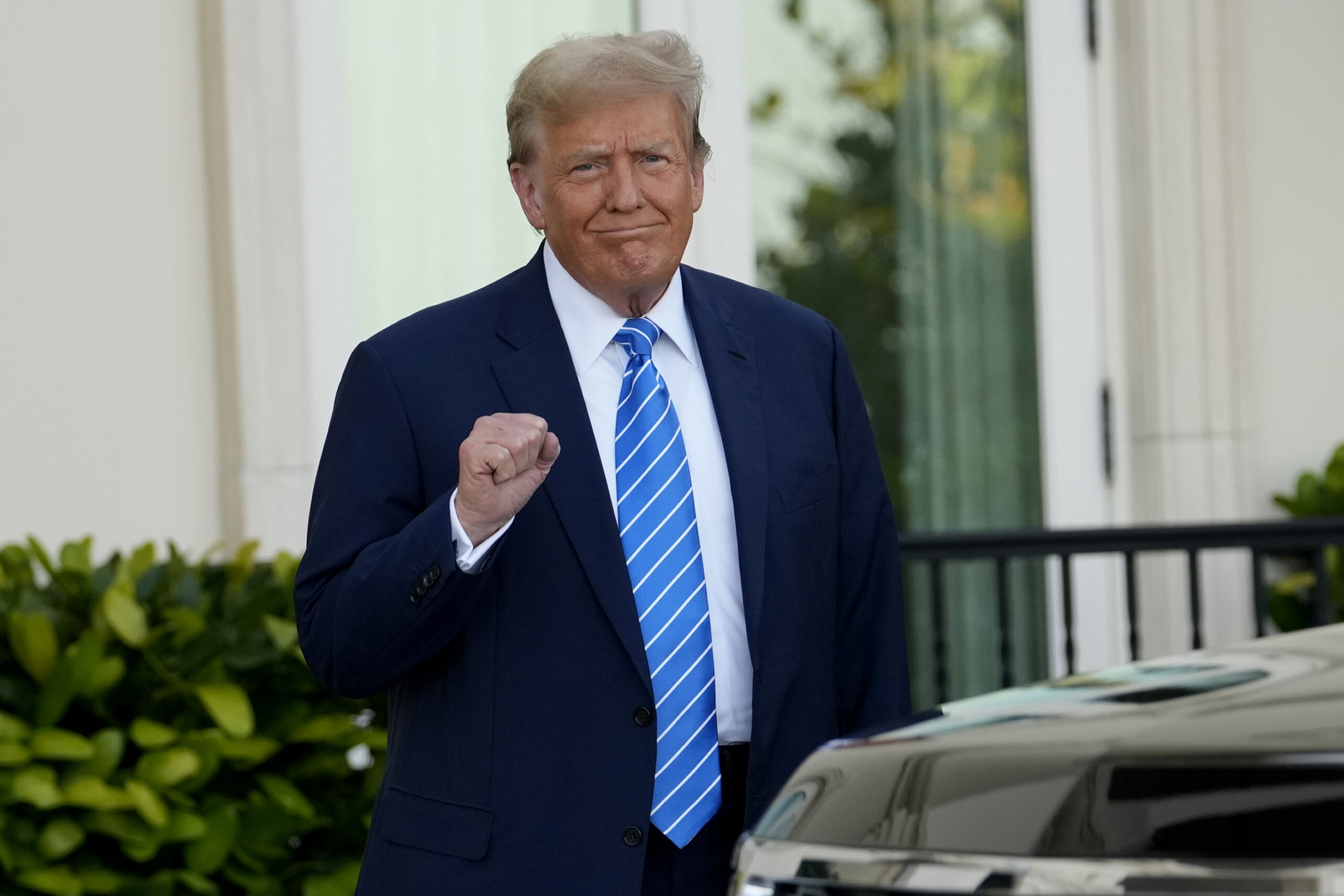 Former President Donald Trump pumps his fist as he arrives for a GOP fundraiser, Saturday, April 6, 2024, in Palm Beach, Fla. Photo: Lynne Sladky/AP