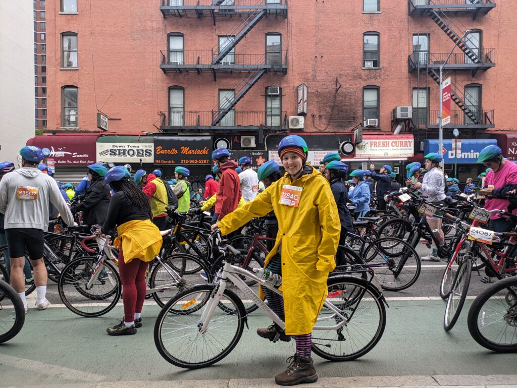 MANHATTAN — Ready for a rainy ride: Brooklyn Eagle staff member Suzanne Akceylan from South Brooklyn wears heavy gear for her first TD Five Borough Bike Tour, Sunday, May 5, 2024, a day that was also a bit chilly. “Although a bit clunky, the raincoat was comforting for a jubilant ride!,” she said as she joined more than 32,000 cyclists of all skill levels for the 40-mile charitable bike ride that began in lower Manhattan with the finish line at Fort Wadsworth in Staten Island.