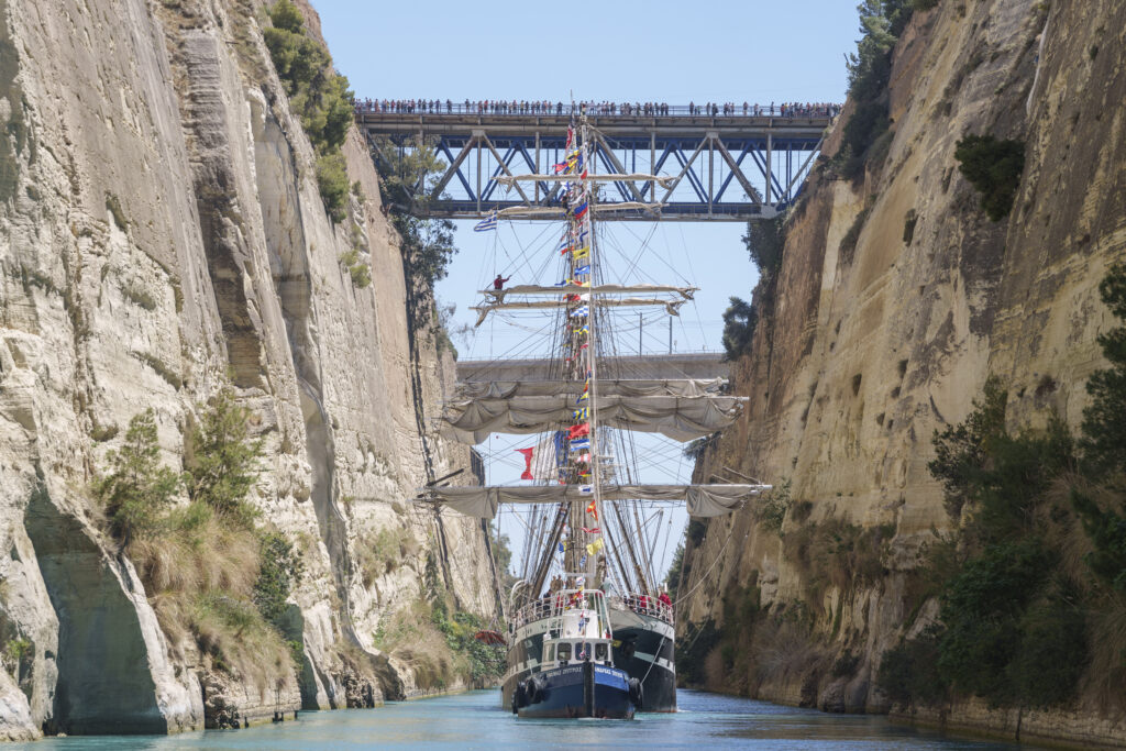Belem, the three-masted sailing ship carrying the Olympic flame to France, is being towed through the Corinth canal in Corinth, Greece, Sunday, April 28, 2024. The French sailing ship sailed from the port of Piraeus Saturday, a day after the handover ceremony from the Greek Olympic Committee to the Summer Olympics organizers, and will arrive at Marseille, France, on May 8. (AP Photo/Petros Giannakouris)