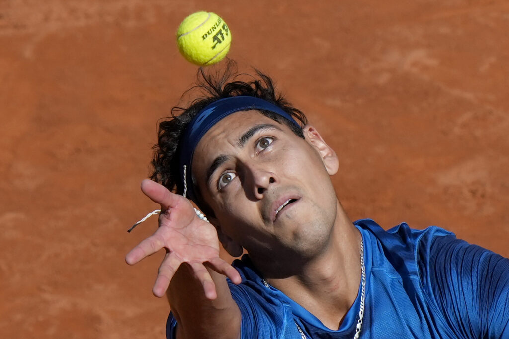 Chile's Alejandro Tabilo serves to Germany's Alexander Zverev during a men's tennis semifinal match at the Italian Open tennis tournament, in Rome, Friday, May 17, 2024. (AP Photo/Andrew Medichini)