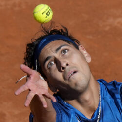 Chile's Alejandro Tabilo serves to Germany's Alexander Zverev during a men's tennis semifinal match at the Italian Open tennis tournament, in Rome, Friday, May 17, 2024. (AP Photo/Andrew Medichini)