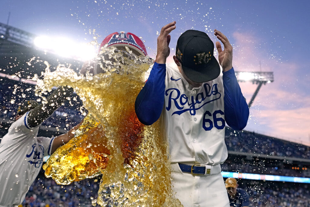 Kansas City Royals relief pitcher James McArthur is doused by teammates after their baseball game against the Oakland Athletics Saturday, May 18, 2024, in Kansas City, Mo. The Royals won 5-3. (AP Photo/Charlie Riedel)