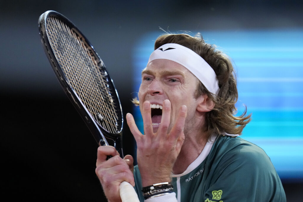 Andrey Rublev, of Russia, reacts during a final match against Felix Auger-Aliassime, of Canada, at the Madrid Open tennis tournament in Madrid, Spain, Sunday, May 5, 2024. (AP Photo/Manu Fernandez)