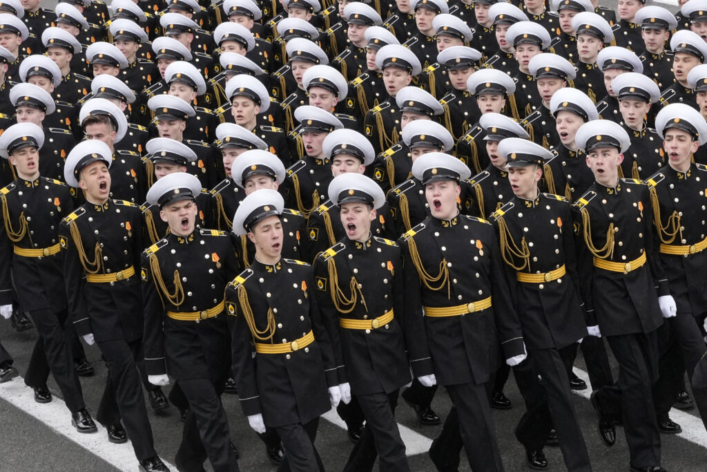 Russian Navy cadets march during a rehearsal for the Victory Day military parade at Dvortsovaya (Palace) Square in St. Petersburg, Russia, Sunday, May 5, 2024. The parade will take place at St. Petersburg's Palace Square on May 9 to celebrate 79 years since the victory in WWII. (AP Photo/Dmitri Lovetsky)