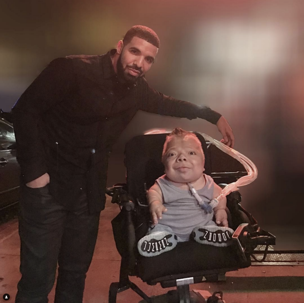 Drake with Christopher Alvarez in 2017.