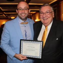 BRLA President Adam Kalish presents Hon. Matthew D'Emic with a certificate of appreciation for his insightful lecture on the future of Rikers Island at the Bay Ridge Lawyers Association meeting in Brooklyn. Brooklyn Eagle photos by Mario Belluomo